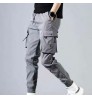 Wholesale autumn men's pants hip-hop harem jogging pants 2021 new men's trousers men's solid color multi-pocket overalls tights