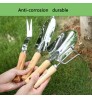 Four-piece garden tool set with stainless steel wooden handle