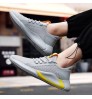 2022 New fly woven continuously empty net men's fashionable shoes sports running shoes