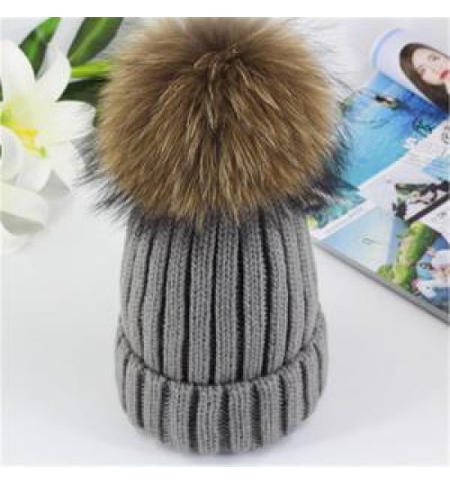 Winter 2020 new wholesale ladies really big raccoon fur ball thick striped wool hat parent-child outdoor leisure knitted hat