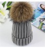 Winter 2020 new wholesale ladies really big raccoon fur ball thick striped wool hat parent-child outdoor leisure knitted hat